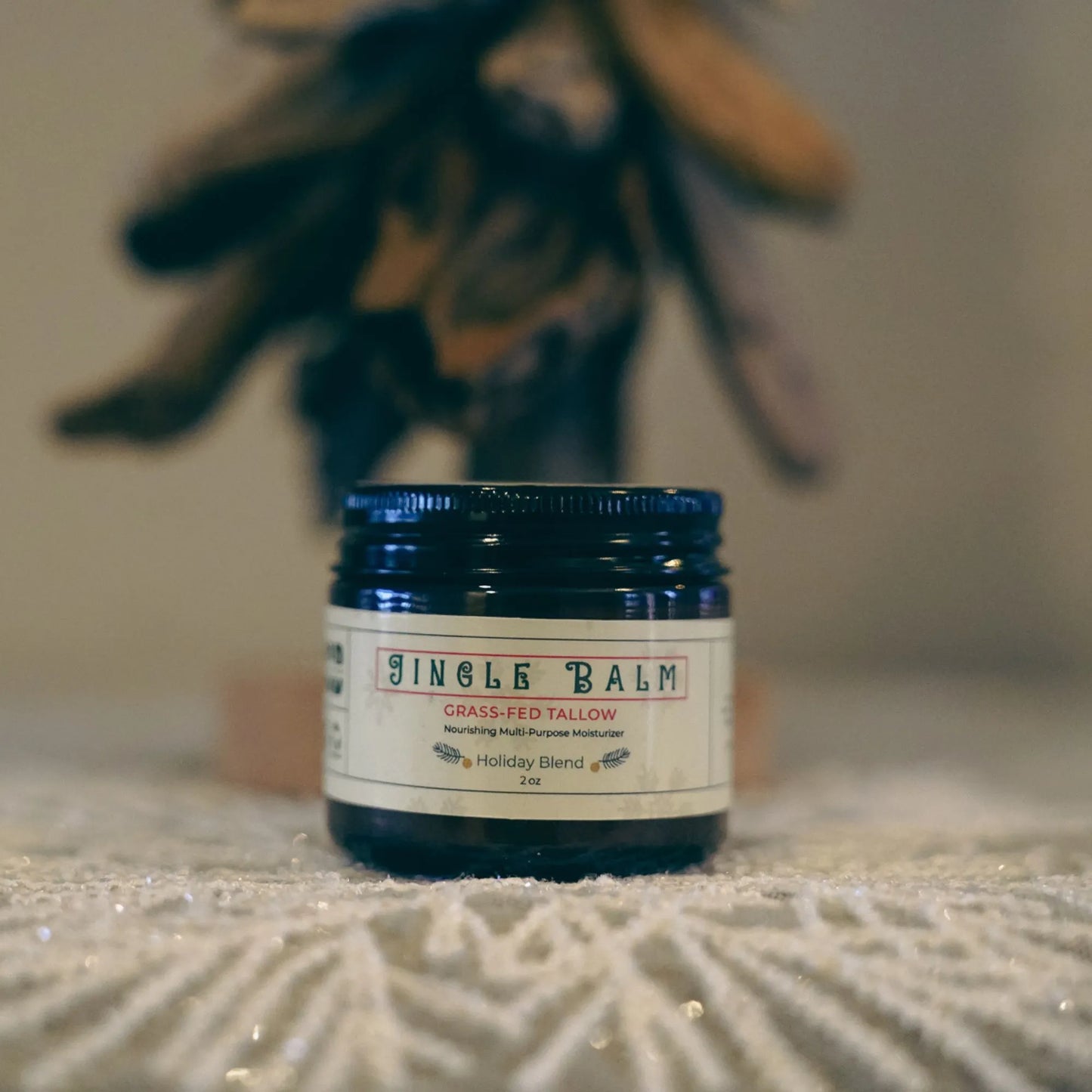 Jingle Balm: A festive, nourishing tallow balm perfect for soothing dry skin during the holiday season